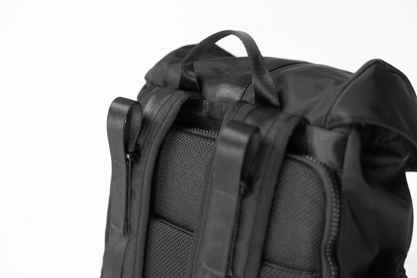 Secure top handle with thick backpack straps for added comfort